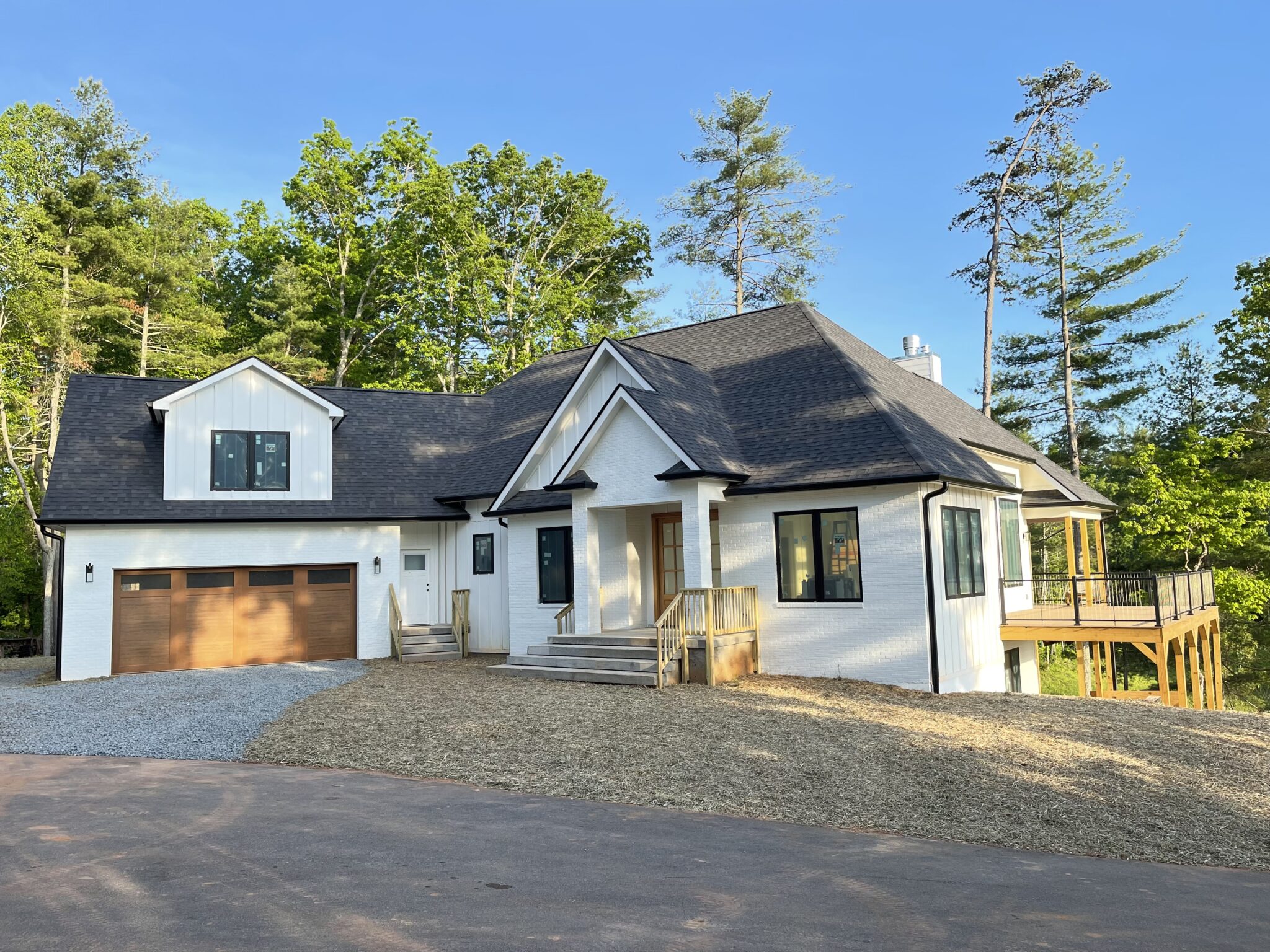 Front entrance and garage of a newly built custom home