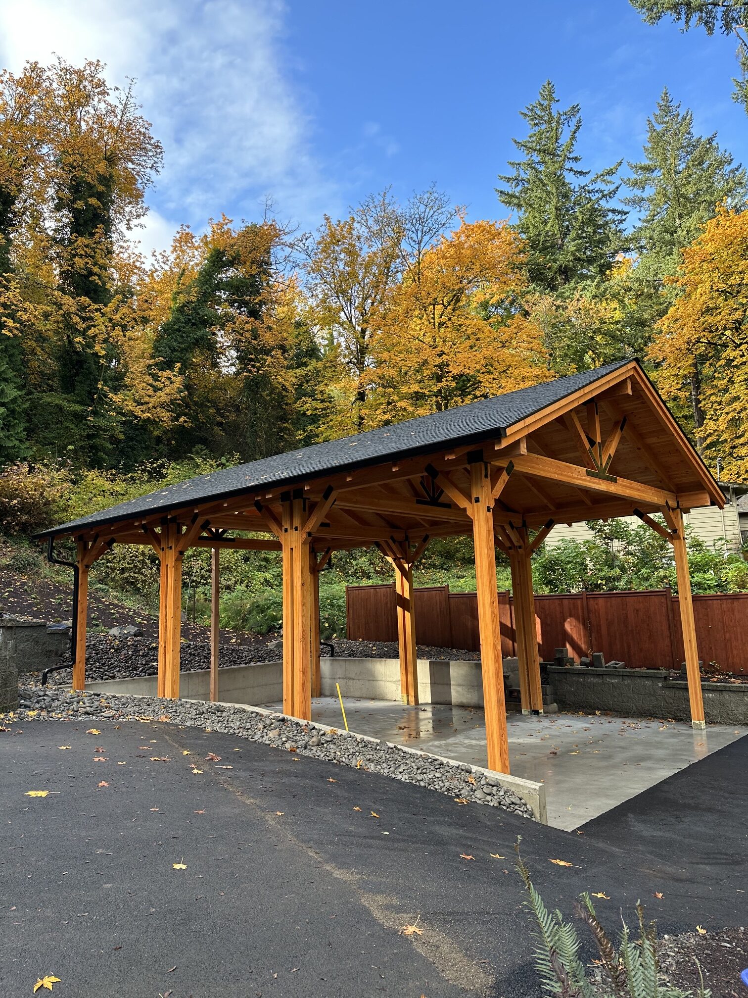 Custom timber-covered patio structure built on a concrete slab in the Portland, Oregon area.